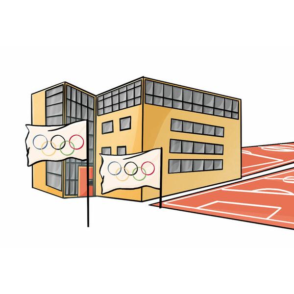 Moderner Geb&auml;udekomplex mit gro&szlig;en Fensterfronten, umgeben von Fahnen mit Olympischen Ringen und einer Sportfl&auml;che.